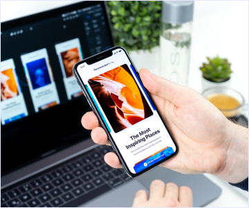 Some app on the phone in front of the computer